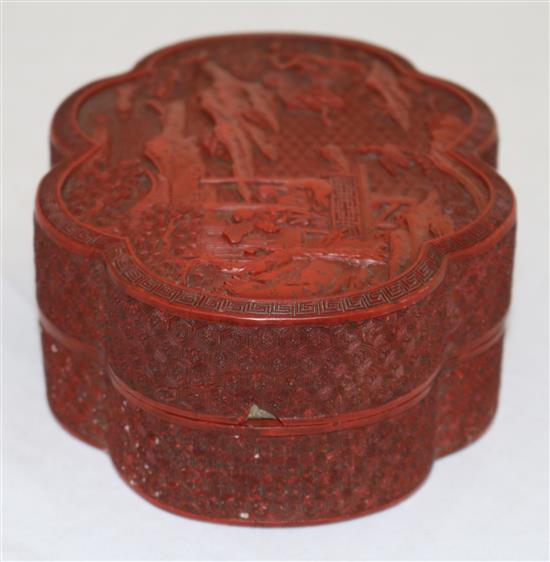 A Chinese cinnabar lacquer sexafoil box and cover, Qianlong / Jiaqing period, width 16.2cm, slight damage